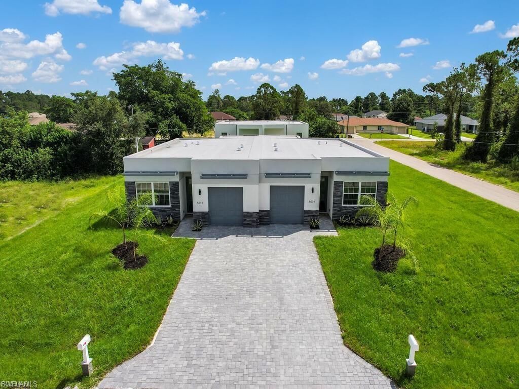 5013-5015 24th ST SW, LEHIGH ACRES, FL 33973 — exterior