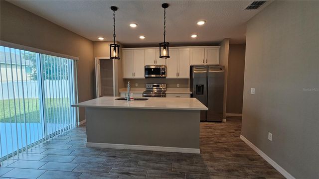 1921 BELL CREEK LOOP, Fruitland Park, FL 34731