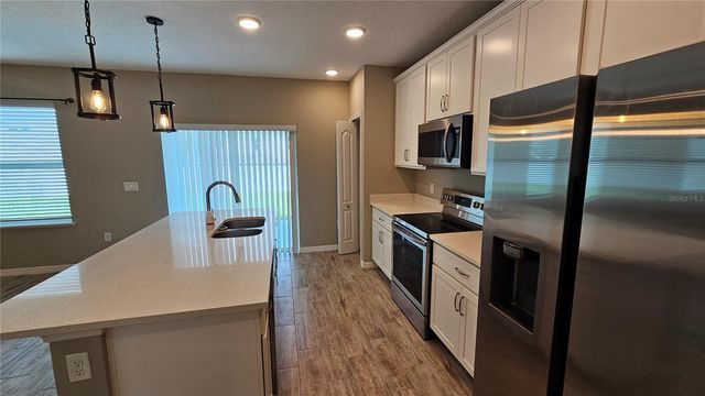 1921 BELL CREEK LOOP, Fruitland Park, FL 34731