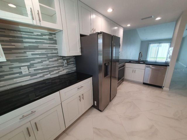 1833 ORANGE BOULEVARD WAY, Palm Harbor, FL 34683
