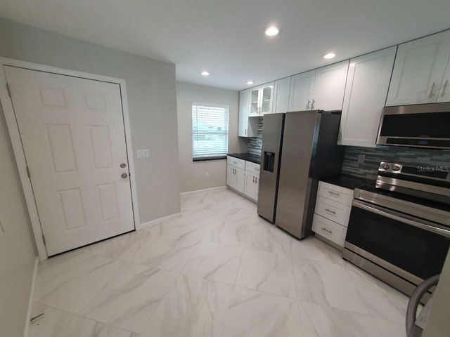 1833 ORANGE BOULEVARD WAY, Palm Harbor, FL 34683