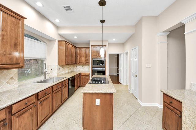 4126 Midstream Drive, Missouri City, TX 77459