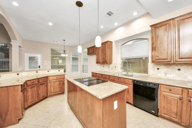 4126 Midstream Drive, Missouri City, TX 77459