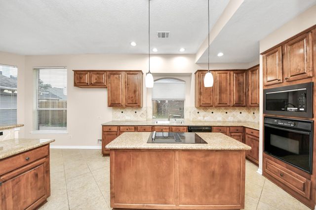 4126 Midstream Drive, Missouri City, TX 77459