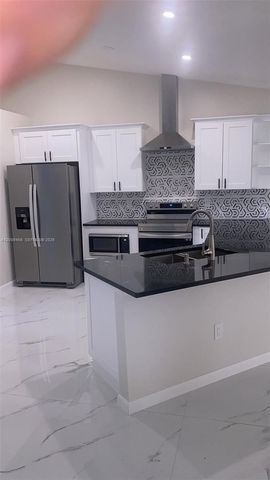1198 SW Ingrassina Ave, Port St. Lucie, FL 34953