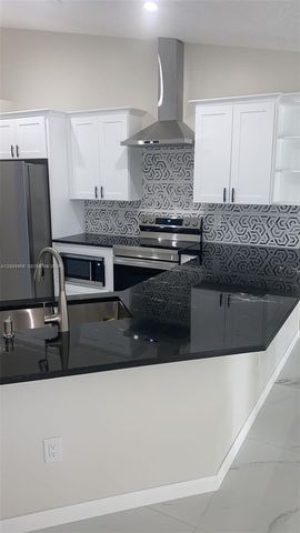1198 SW Ingrassina Ave, Port St. Lucie, FL 34953