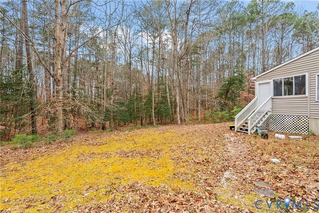 521 Scoggins Creek Trl, Hartfield, VA 23071