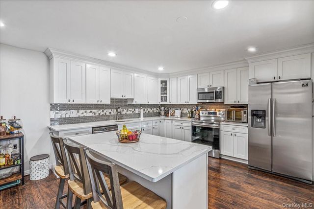 214 Woodycrest Drive, Holtsville, NY 11742