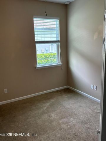 119 S HUMMINGBIRD Place, Palm Coast, FL 32164