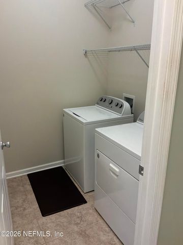 119 S HUMMINGBIRD Place, Palm Coast, FL 32164