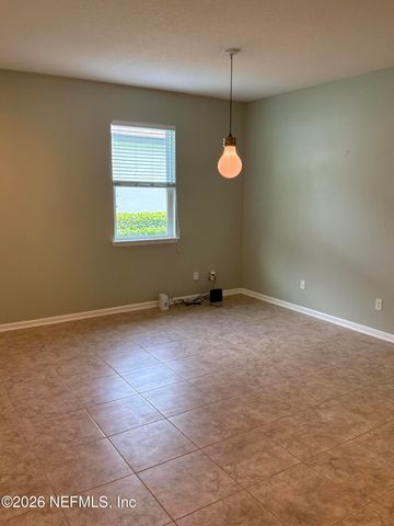 119 S HUMMINGBIRD Place, Palm Coast, FL 32164