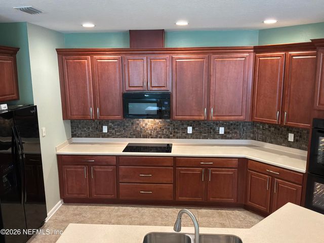 119 S HUMMINGBIRD Place, Palm Coast, FL 32164