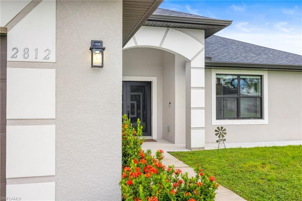 2812 12th ST SW, LEHIGH ACRES, FL 33976 — photo 2