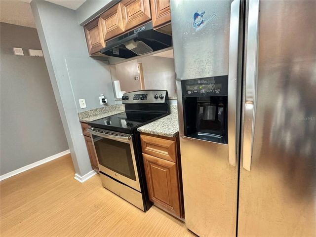 4852 MARKS TERRACE 52, Orlando, FL 32811