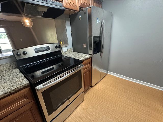 4852 MARKS TERRACE 52, Orlando, FL 32811