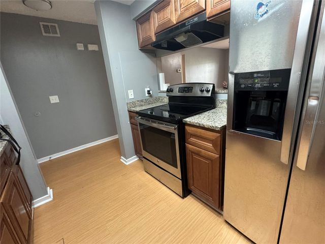 4852 MARKS TERRACE 52, Orlando, FL 32811