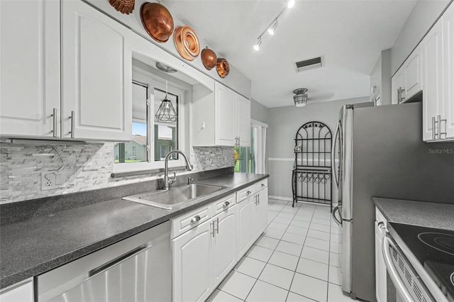 1496 QUEEN ANNE DRIVE, Palm Harbor, FL 34684