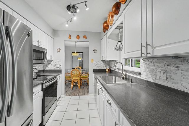 1496 QUEEN ANNE DRIVE, Palm Harbor, FL 34684