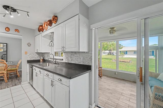 1496 QUEEN ANNE DRIVE, Palm Harbor, FL 34684