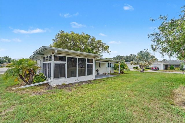 1496 QUEEN ANNE DRIVE, Palm Harbor, FL 34684