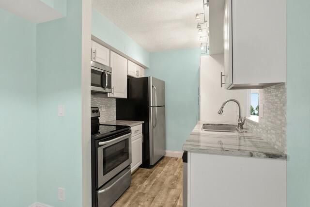 6479 Chasewood Drive B, Jupiter, FL 33458