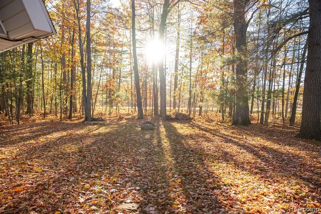 9887 W Higgins Lake Drive, Roscommon, MI 48653