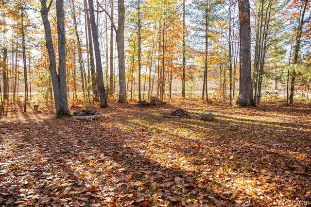 9887 W Higgins Lake Drive, Roscommon, MI 48653