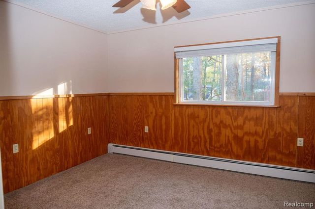 9887 W Higgins Lake Drive, Roscommon, MI 48653