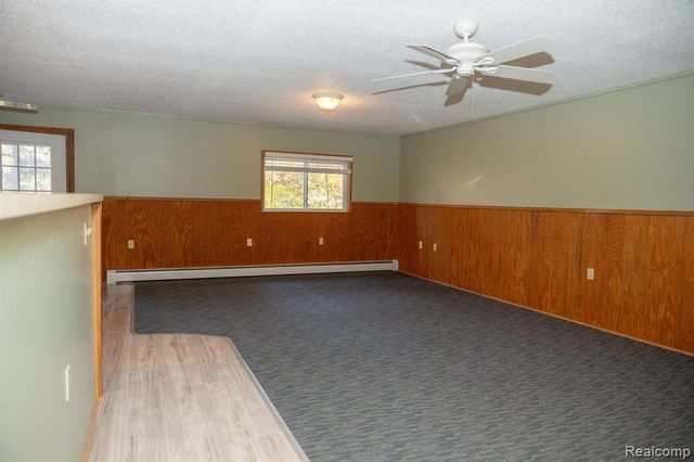 9887 W Higgins Lake Drive, Roscommon, MI 48653