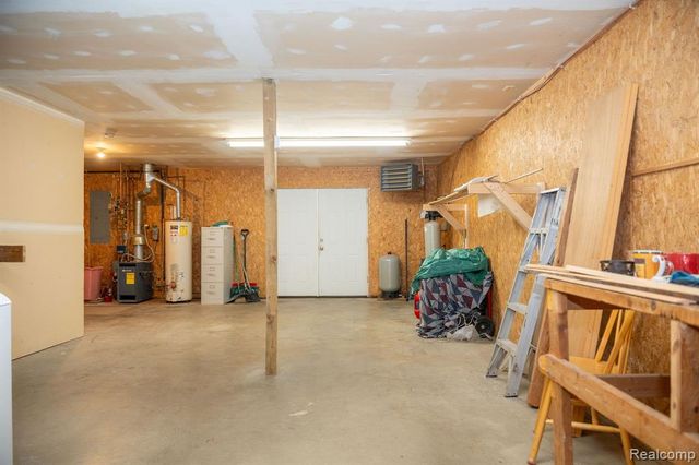 9887 W Higgins Lake Drive, Roscommon, MI 48653