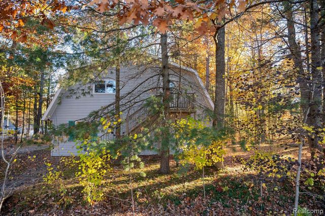 9887 W Higgins Lake Drive, Roscommon, MI 48653