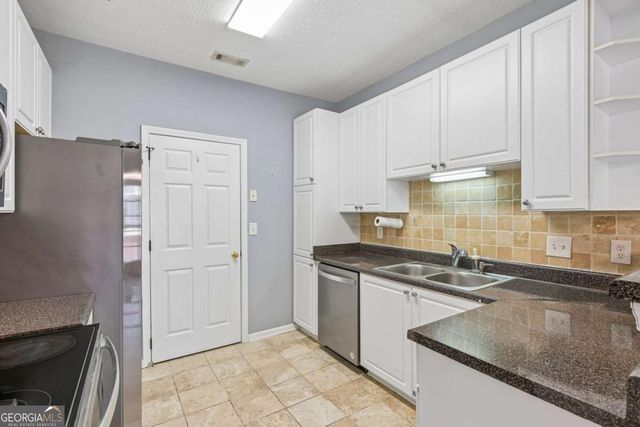 5112 Woodland Lane, Alpharetta, GA 30009