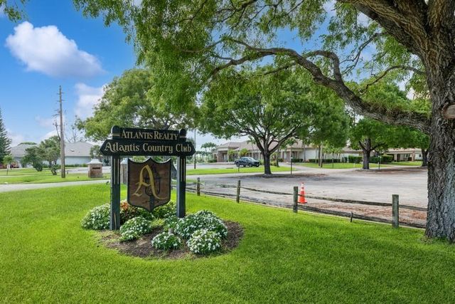 116 Palm Circle, Atlantis, FL 33462