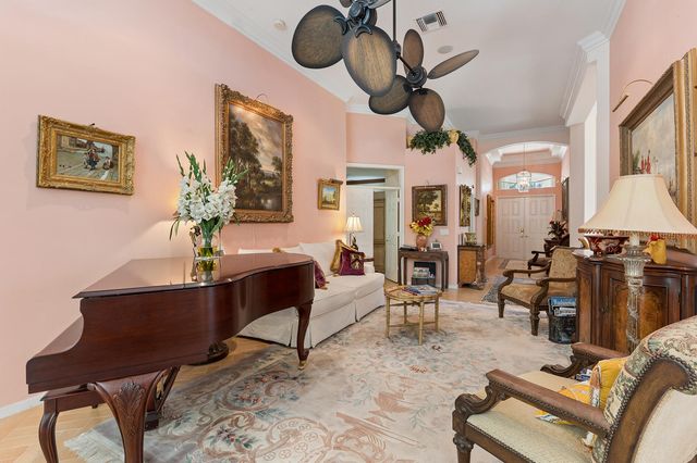 116 Palm Circle, Atlantis, FL 33462