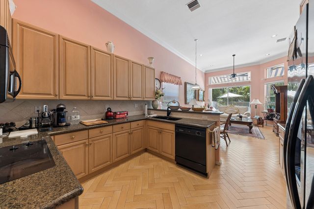 116 Palm Circle, Atlantis, FL 33462