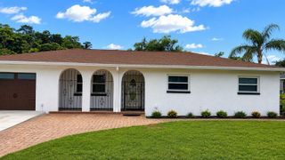 6412 N WOODLYNNE AVENUE, Tampa, FL 33614