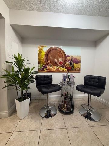 8670 NW 6th Ln 4-210, Miami, FL 33126