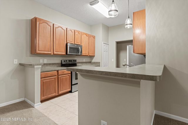 7043 DEER LODGE Circle 110, Jacksonville, FL 32256