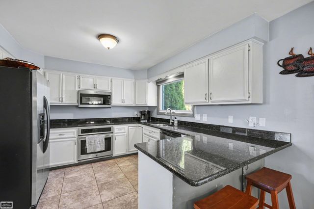 48088 Greenbriar Drive, Macomb Twp, MI 48044