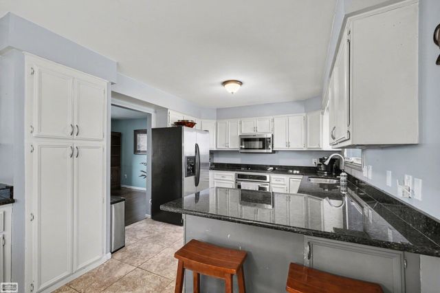 48088 Greenbriar Drive, Macomb Twp, MI 48044