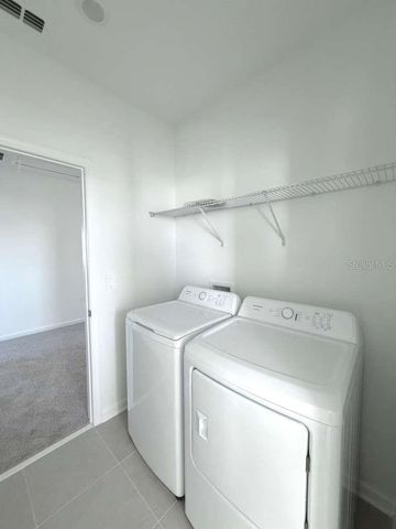 5664 LEMON GRASS STREET, Clermont, FL 34714