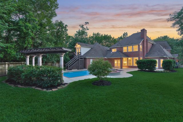 62 N Turtle Rock Court, The Woodlands, TX 77381