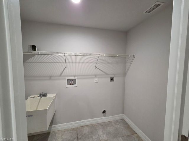 2612 34th ST SW, Lehigh Acres, FL 33976