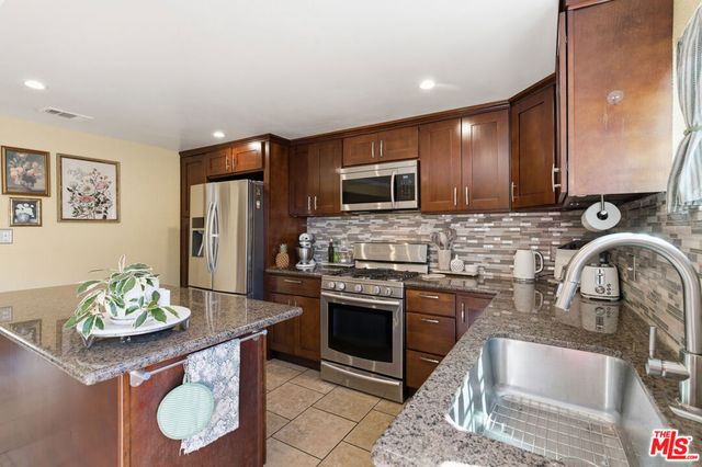 9781 S Karmont Avenue, South Gate, CA 90280