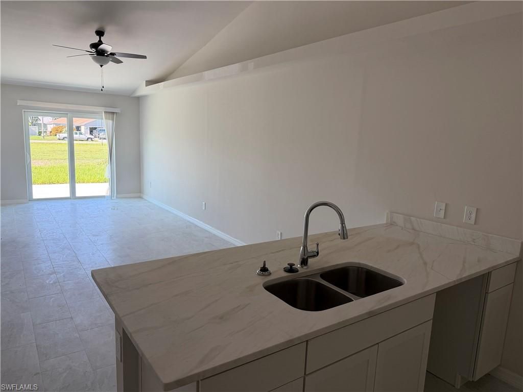 703 SE 8th ST, CAPE CORAL, FL 33990 — photo 2