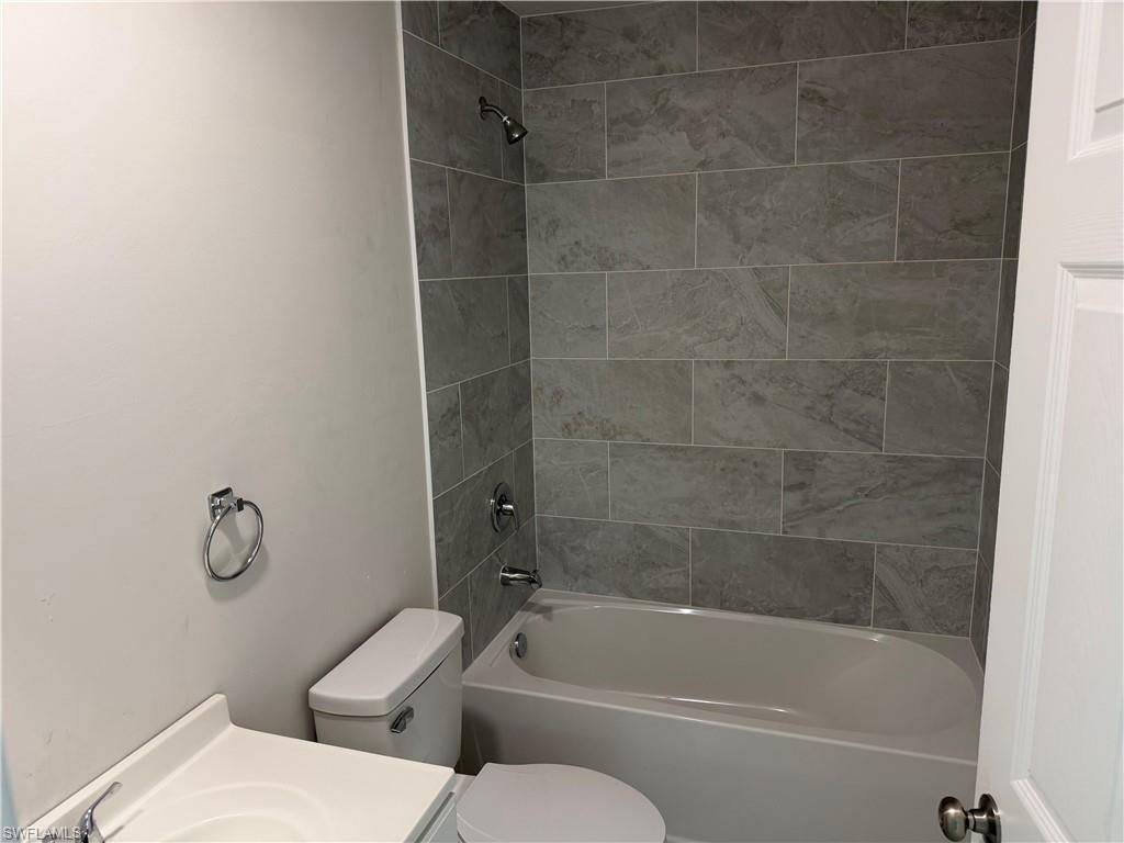 703 SE 8th ST, CAPE CORAL, FL 33990 — photo 4