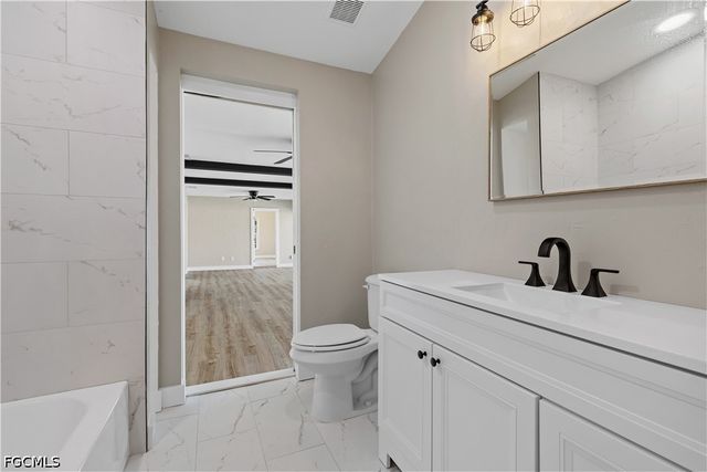 1725 SE 3rd ST, Cape Coral, FL 33990