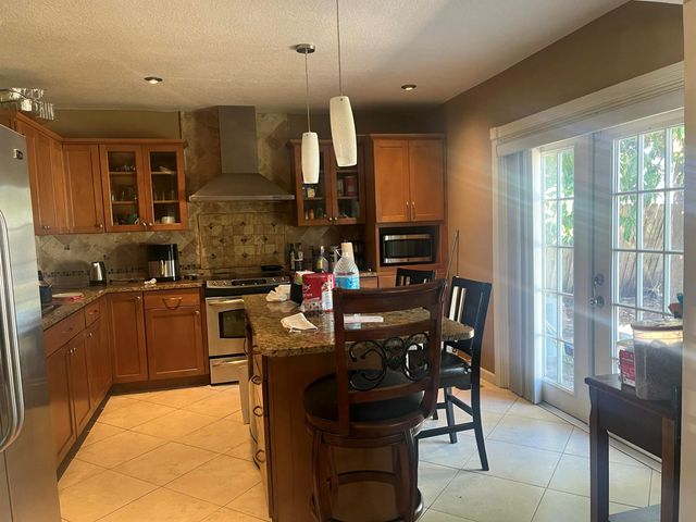 320 Poe Drive, Palm Springs, FL 33461