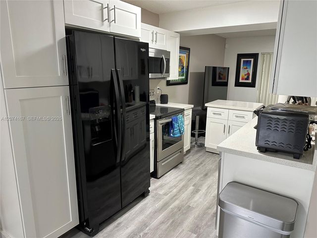 9849 S Riverside Drive 8-26, Coral Springs, FL 33071