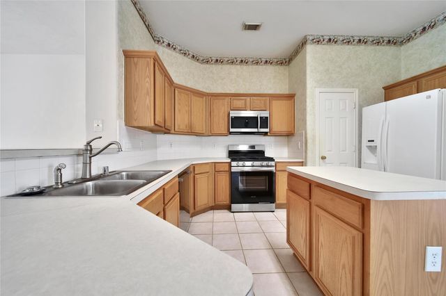 21744 York Timbers Drive, Kingwood, TX 77339